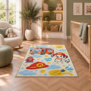 Cute Fire Truck and Dalmatian rug in a nursery with a crib and armchair