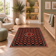 Maltese Cross Lattice rug in a nursery with a crib and armchair