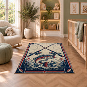 Crossed rods fish emblem rug in a nursery with a crib and armchair
