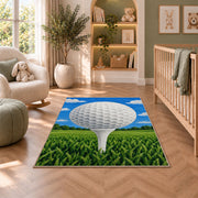 Golf ball on tee rug in a nursery with a crib and armchair
