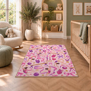 Gymnastics Pattern Rug in a nursery with a crib and armchair