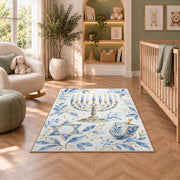 Watercolor Hanukkah Rug in a nursery with a crib and armchair