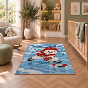 Polar Bear Hockey Player rug in a nursery with a crib and armchair