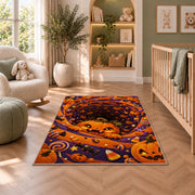 Cute pumpkin and candy spiral area rug in a nursery seating area
