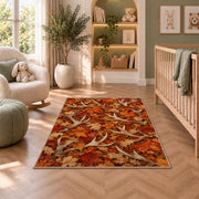 Shed Antlers Autumn rug in a nursery with a crib and armchair