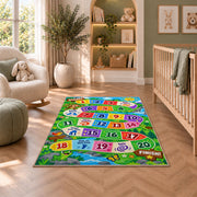 Rainbow adventure game rug with numbered colorful path tiles and activity prompts, shown in a bedroom setting