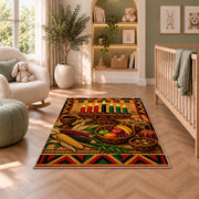 Kwanzaa Table Rug in a nursery with a crib and armchair