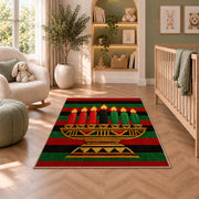 Kwanzaa Stripe Rug in a nursery with a crib and armchair