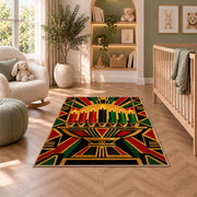 Art Deco Kwanzaa Rug in a nursery with a crib and armchair