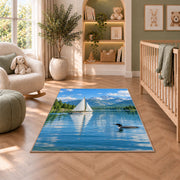 Sailboat and loon on lake rug in a nursery with a crib and armchair