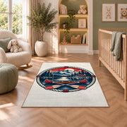 Lake house badge emblem rug in a nursery with a crib and armchair