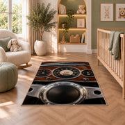 Vintage dashboard gauges rug in a nursery with a crib and armchair