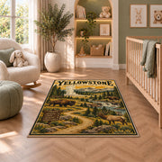 Yellowstone travel poster with bison and elk rug in a nursery seating area