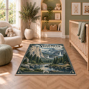 Yosemite Valley travel poster rug in a nursery seating area