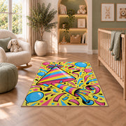 Party hat and noisemaker rug in a nursery with a crib and armchair