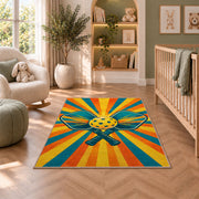 Pickleball Sunburst Rug in a nursery with a crib and armchair