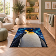 Emperor Penguin Rug in a nursery with a crib and armchair
