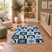Penguin Checkered Rug in a nursery with a crib and armchair