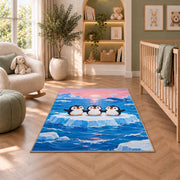 Penguins on Iceberg Rug in a nursery with a crib and armchair