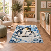 Mother and Baby Penguin Rug in a nursery with a crib and armchair
