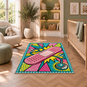 Pop Art Bandage Rug in a nursery with a crib and armchair
