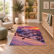 Sunset ski slope rug in a nursery with a crib and armchair
