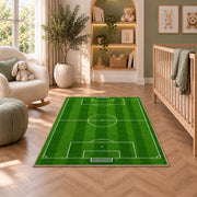 soccer field top view rug in a nursery with a crib and armchair