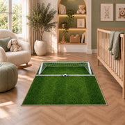 soccer goal top view rug in a nursery with a crib and armchair