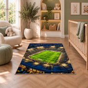 soccer stadium at night rug in a nursery with a crib and armchair