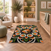 Sushi Mandala Rug in a nursery with a crib and armchair
