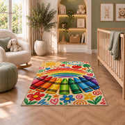 Crayon Rainbow Rug in a nursery with a crib and armchair
