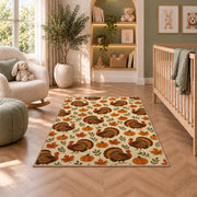 Turkey and Pumpkin Pattern Rug in a nursery with a crib and armchair
