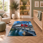 Semi truck crossing a steel bridge rug in a nursery with a crib and armchair