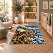 Coastal Train Rug in a nursery with a crib and armchair