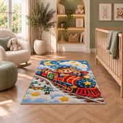 Teddy Bear Train Rug in a nursery with a crib and armchair