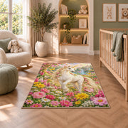 unicorn in a flower garden rug in a nursery with a crib and armchair