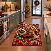 A happy golden puppy in a Santa hat and red sweater raises a soft paw toward the viewer; rug shown in a holiday kitchen