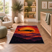 Helicopter Sunset rug in a nursery with a crib and armchair