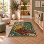 Fantasy island map rug with red volcanic terrain, green forest, and turquoise sea in a nursery seating area