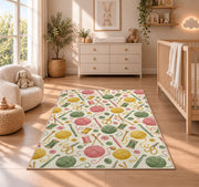 Knitting Tools Pattern Rug in a nursery beside a crib and dresser
