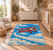Vintage Biplane Rug in a nursery beside a crib and dresser