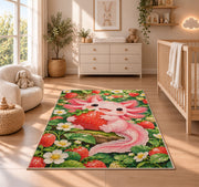Axolotl Strawberry Rug in a nursery beside a crib and dresser