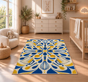 Geometric whisks and measuring cups rug in a nursery beside a crib and dresser