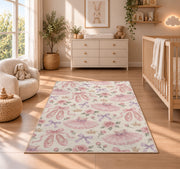 Ballet pattern rug in a nursery beside a crib and dresser