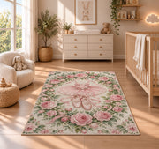 Rose wreath ballet rug in a nursery beside a crib and dresser