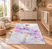 Watercolor ballerina rug in a nursery beside a crib and dresser