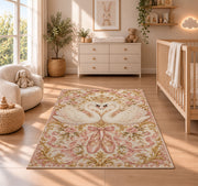 Swan heart rug in a nursery beside a crib and dresser