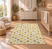 Tiny Bee Pattern Rug in a nursery beside a crib and dresser