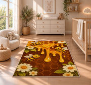 Dripping Honeycomb Bee Rug in a nursery beside a crib and dresser