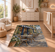 Parisian Sidewalk Cafe rug in a nursery beside a crib and dresser